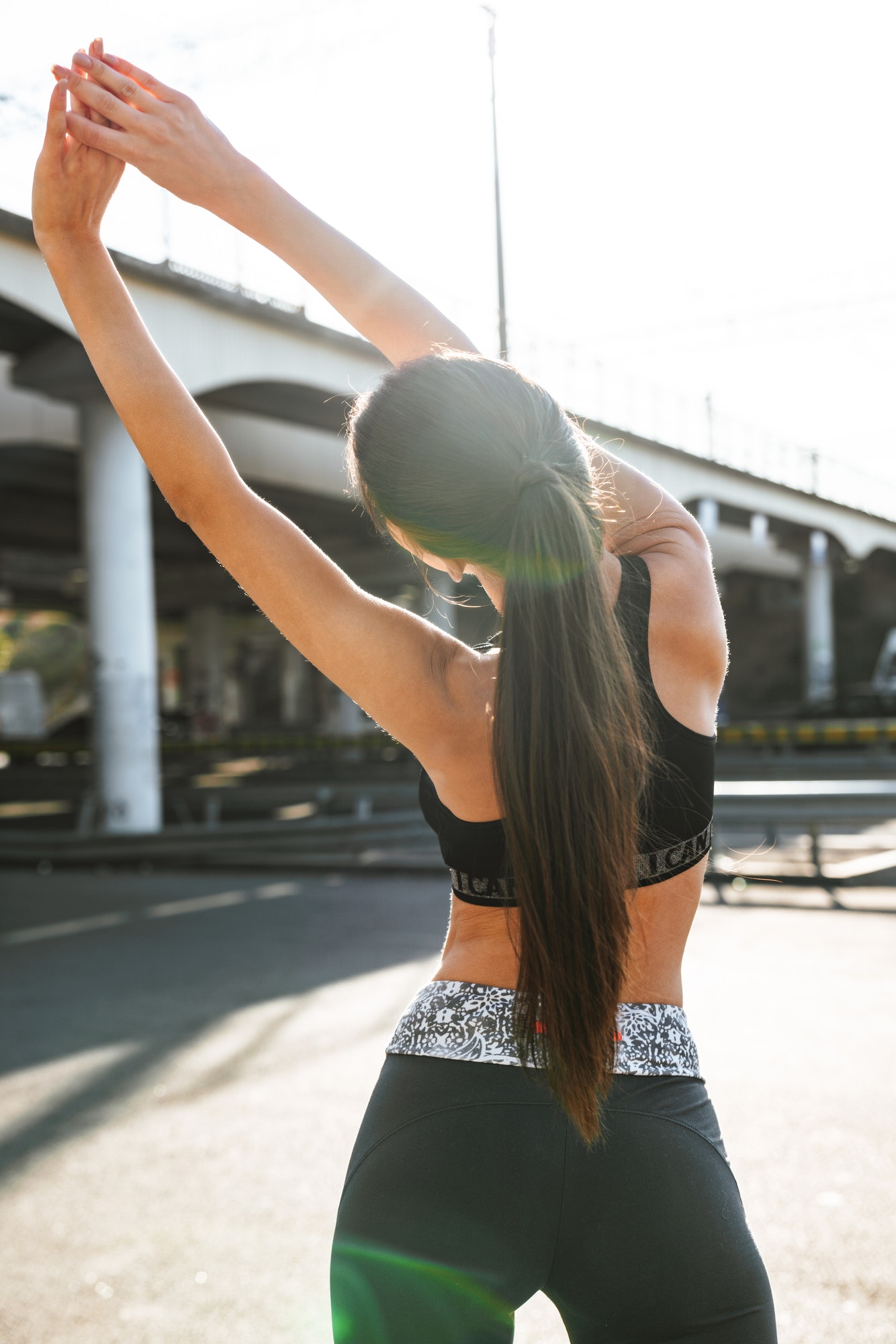 fitness-woman-make-stretching-exercises-outdoors-.jpg